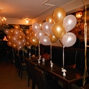 helium ballon trossen Zandvoort goud wit op tafel als decoratie 