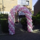 ballonboog huwelijk in tuin Breezand roze met wit