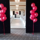 Huwelijk Grand Hotel Huis ter Duin Noordwijk voorzien van ballonnen met helium als trosjes