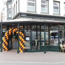 ballonnenboog Amsterdam voor Hallooween kleuren oranje zwart