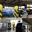 ballon decoraties auto dealers Opel pilaren helium ballon trosjes