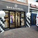 zwart witte ballonpilaren Sneakers.nl nieuwe winkel opening